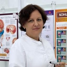 Портретный снимок врача, приём в городе Астана