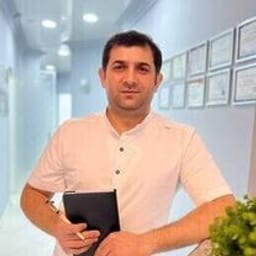 Портретный снимок врача, приём в городе Алматы