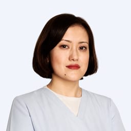Портретный снимок врача, приём в городе Астана