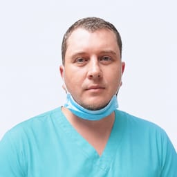Портретный снимок врача, приём в городе Алматы