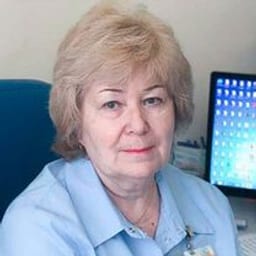 Портретный снимок врача, приём в городе Астана