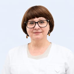 Портретный снимок врача, приём в городе Астана