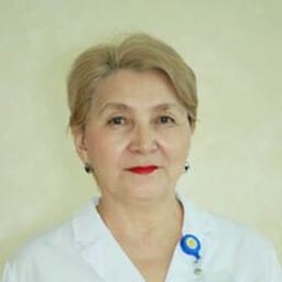 Портретный снимок врача, приём в городе Астана