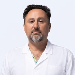 Портретный снимок врача, приём в городе Астана