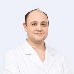Портретный снимок врача, приём в городе Астана