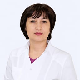 Портретный снимок врача, приём в городе Астана