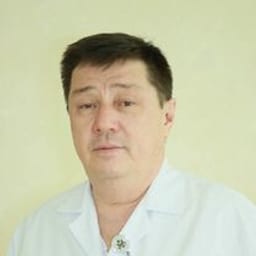 Портретный снимок врача, приём в городе Астана
