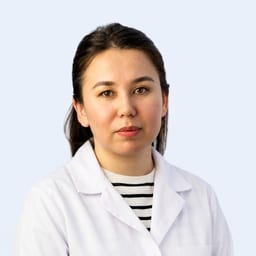 Портретный снимок врача, приём в городе Астана