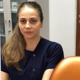 Portrait photo of a doctor, appointment in Almaty