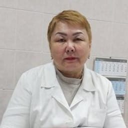 Портретный снимок врача, приём в городе Астана
