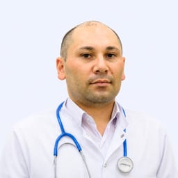Портретный снимок врача, приём в городе Алматы