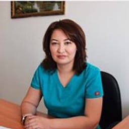 Портретный снимок врача, приём в городе Астана