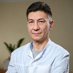 Портретный снимок врача, приём в городе Алматы