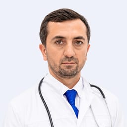 Портретный снимок врача, приём в городе Алматы
