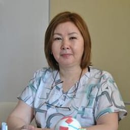 Портретный снимок врача, приём в городе Астана