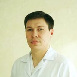 Портретный снимок врача, приём в городе Астана