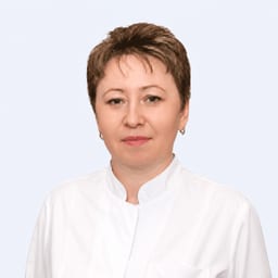 Портретный снимок врача, приём в городе Астана