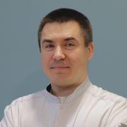 Портретный снимок врача, приём в городе Астана