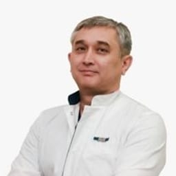 Портретный снимок врача, приём в городе Алматы