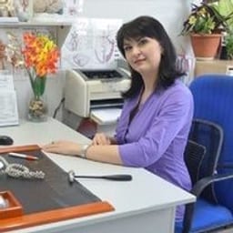 Портретный снимок врача, приём в городе Алматы
