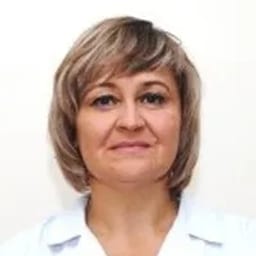 Портретный снимок врача, приём в городе Астана