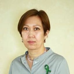 Портретный снимок врача, приём в городе Астана