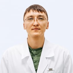 Портретный снимок врача, приём в городе Астана
