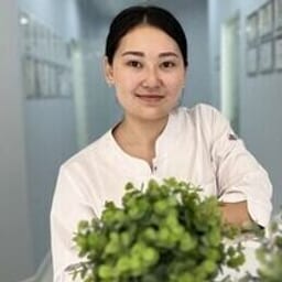 Portrait photo of a doctor, appointment in the city of Almaty Portrait photo of a doctor, appointment in the city of Almaty