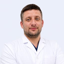 Портретный снимок врача, приём в городе Астана
