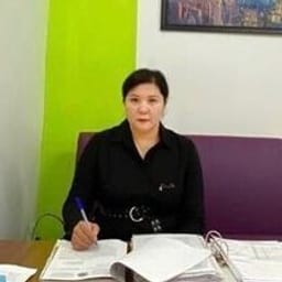 Портретный снимок врача, приём в городе Астана