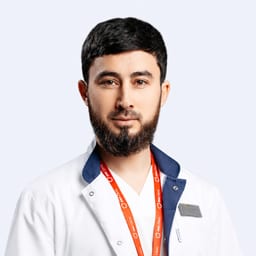 Портретный снимок врача, приём в городе Астана