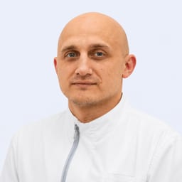 Портретный снимок врача, приём в городе Алматы