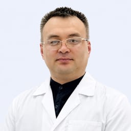 Портретный снимок врача, приём в городе Астана