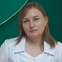 Портретный снимок врача, приём в городе Астана