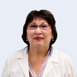Портретный снимок врача, приём в городе Астана