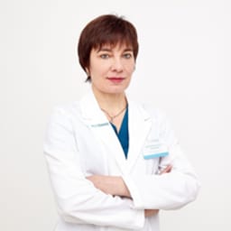 Портретный снимок врача, приём в городе Астана