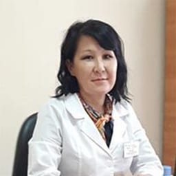 Портретный снимок врача, приём в городе Астана