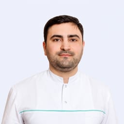 Портретный снимок врача, приём в городе Алматы