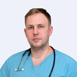 Портретный снимок врача, приём в городе Астана