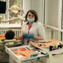 Портретный снимок врача, приём в городе Астана