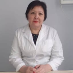 Портретный снимок врача, приём в городе Астана