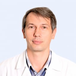 Портретный снимок врача, приём в городе Алматы