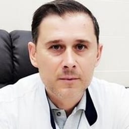 Портретный снимок врача, приём в городе Алматы