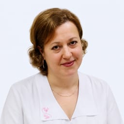 Портретный снимок врача, приём в городе Астана