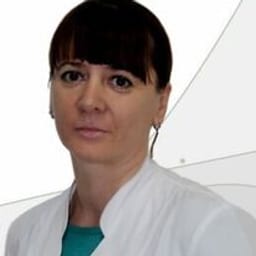 Портретный снимок врача, приём в городе Астана