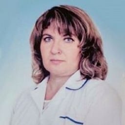 Портретный снимок врача, приём в городе Астана