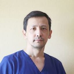 Портретный снимок врача, приём в городе Астана