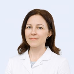 Портретный снимок врача, приём в городе Астана