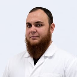 Портретный снимок врача, приём в городе Астана