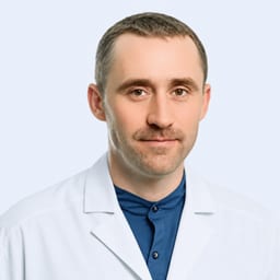 Портретный снимок врача, приём в городе Астана